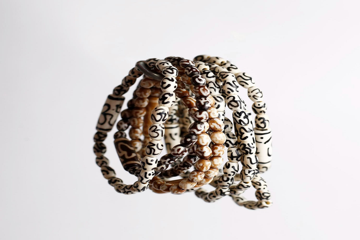 Styling Your Black and White Bead Bracelet with Different Outfits